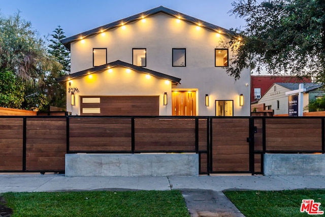 contemporary house featuring a garage