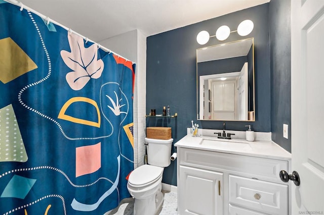 bathroom featuring vanity, toilet, and walk in shower