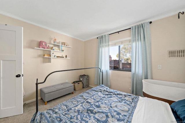 carpeted bedroom featuring crown molding