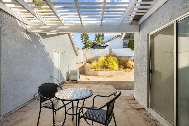 view of patio featuring central AC unit and a pergola