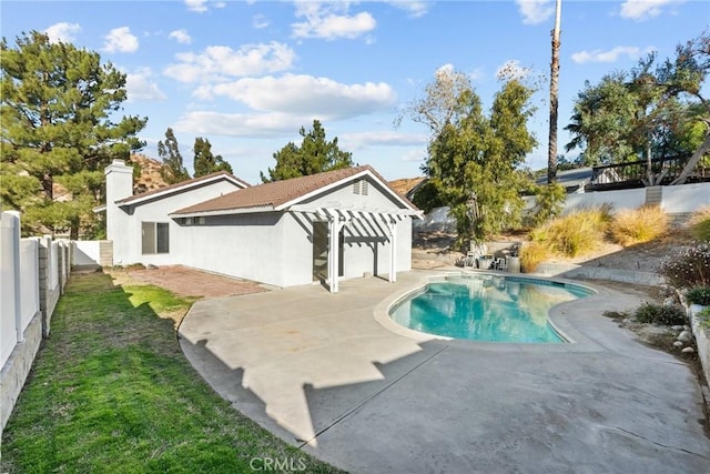 view of swimming pool with a patio area and a pergola