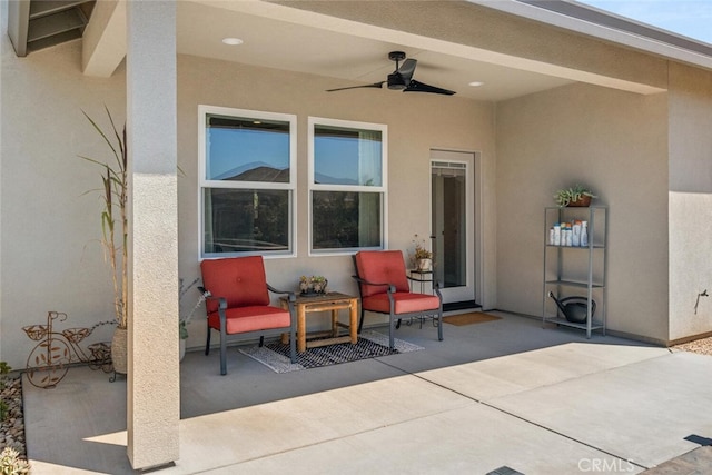 view of patio with ceiling fan