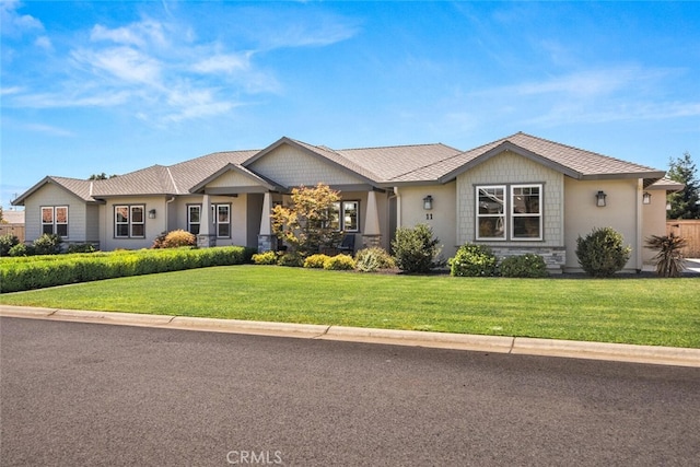 view of front facade with a front lawn