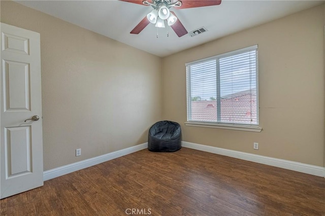 unfurnished room featuring ceiling fan and wood-type flooring