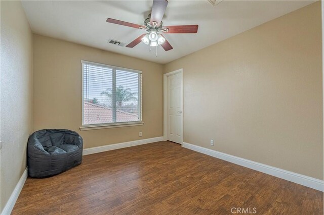 interior space featuring hardwood / wood-style flooring and ceiling fan