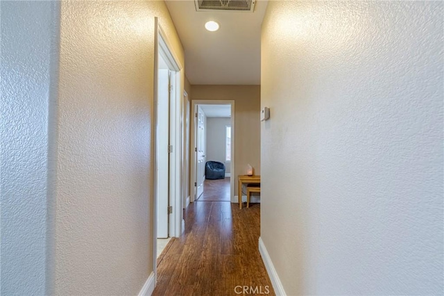 hall featuring dark hardwood / wood-style flooring