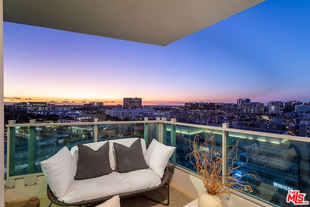 view of balcony at dusk