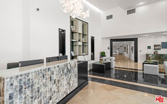 reception area with a notable chandelier