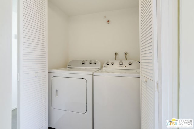 washroom featuring separate washer and dryer