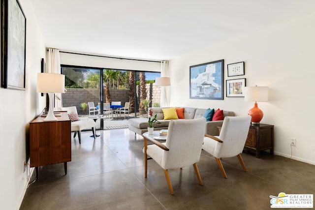 living room with concrete flooring