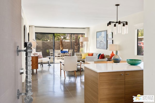 kitchen featuring plenty of natural light and pendant lighting