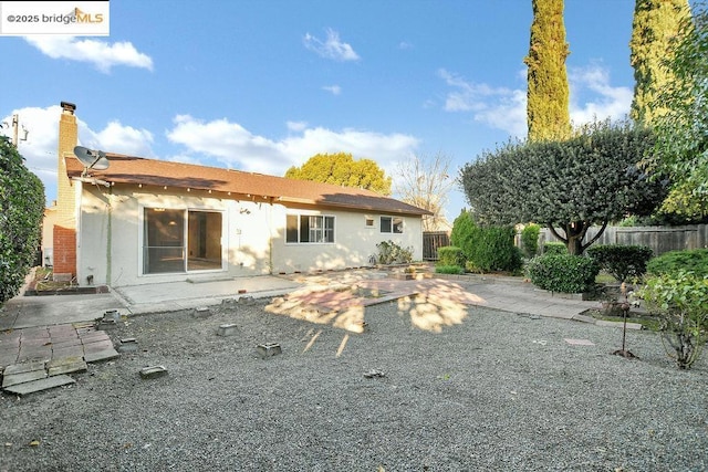 rear view of property with a patio