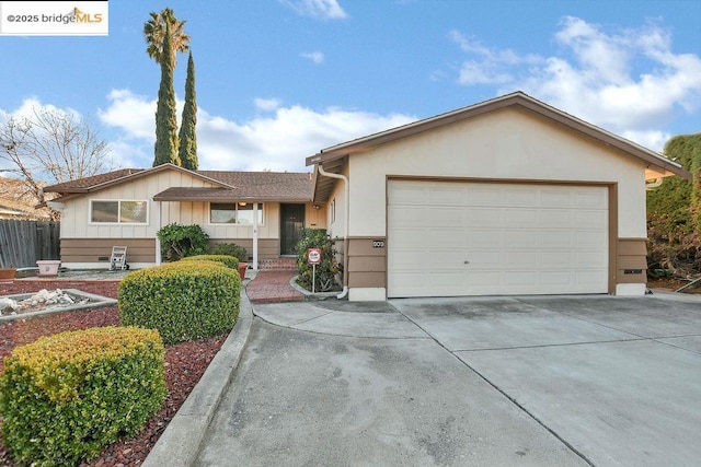 single story home featuring a garage