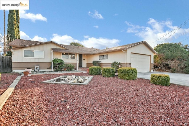 single story home with a garage