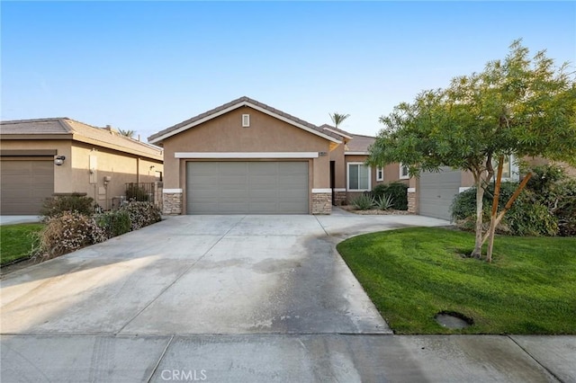 ranch-style home with a garage and a front lawn