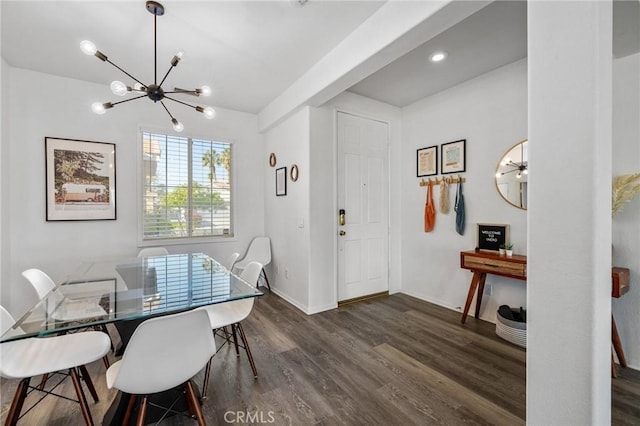 dining space with recessed lighting, dark wood-style flooring, a notable chandelier, and baseboards