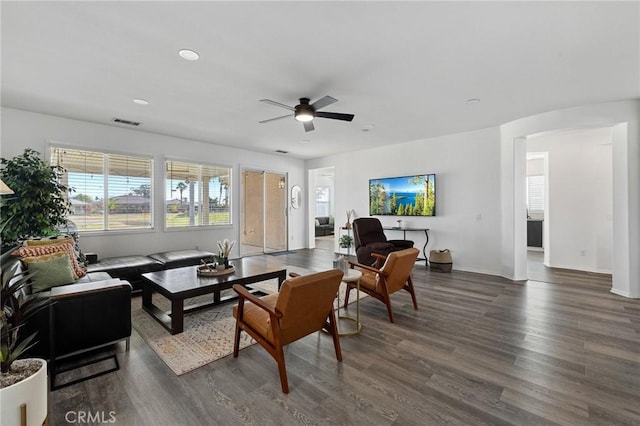 living room featuring dark wood-style floors, recessed lighting, visible vents, ceiling fan, and baseboards