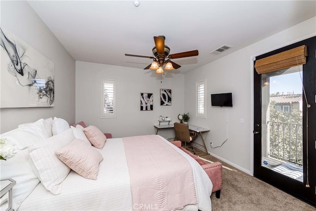 carpeted bedroom featuring ceiling fan and access to outside