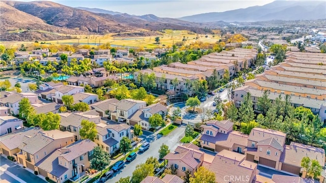 birds eye view of property featuring a mountain view