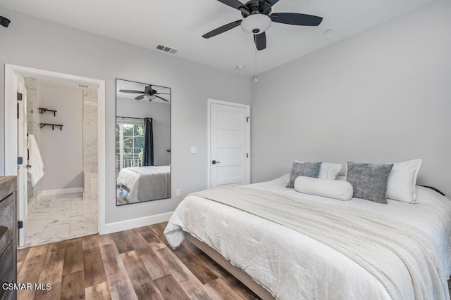 bedroom featuring ceiling fan and wood-type flooring