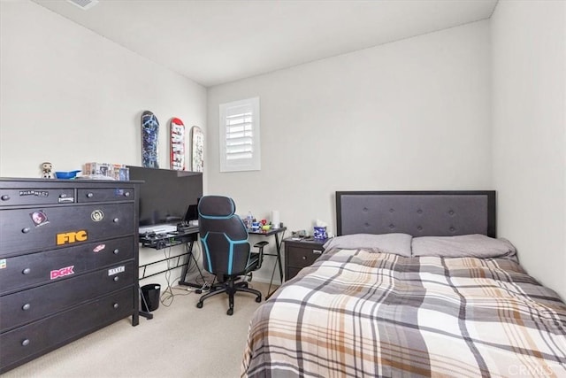 bedroom featuring light colored carpet