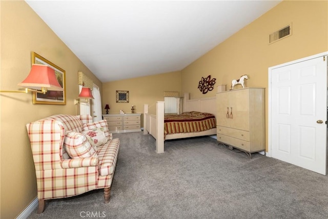 carpeted bedroom featuring lofted ceiling