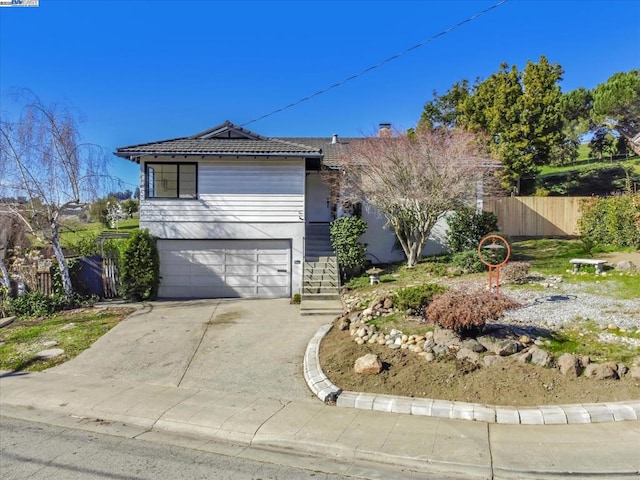 single story home featuring a garage