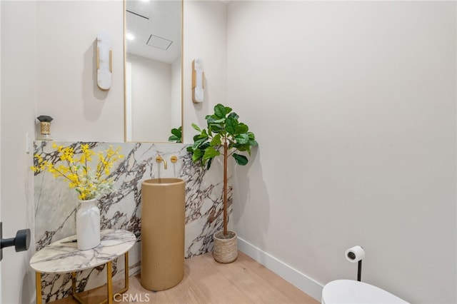 bathroom featuring hardwood / wood-style floors