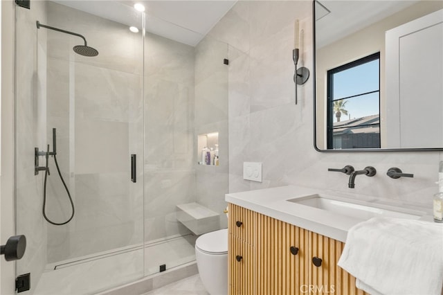 bathroom featuring vanity, toilet, and walk in shower