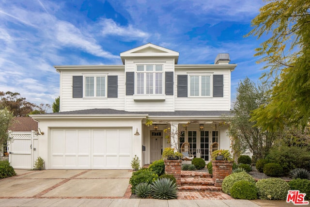 view of front of property with a garage