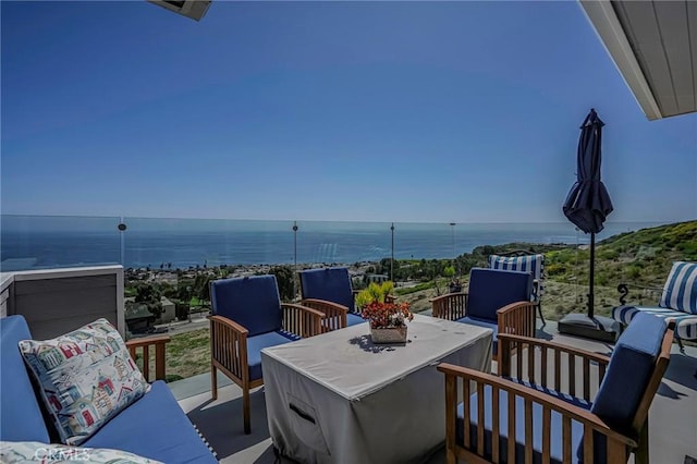 view of patio featuring a water view