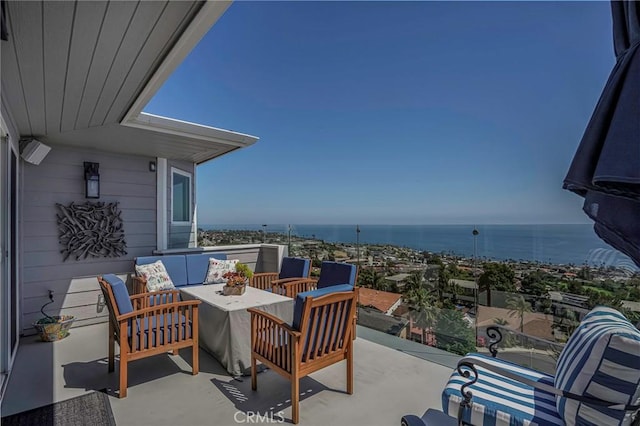 view of patio with an outdoor hangout area and a water view