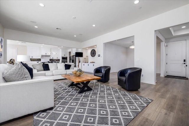 living room featuring dark hardwood / wood-style flooring