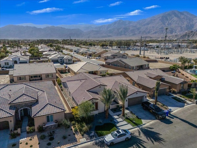 drone / aerial view featuring a mountain view