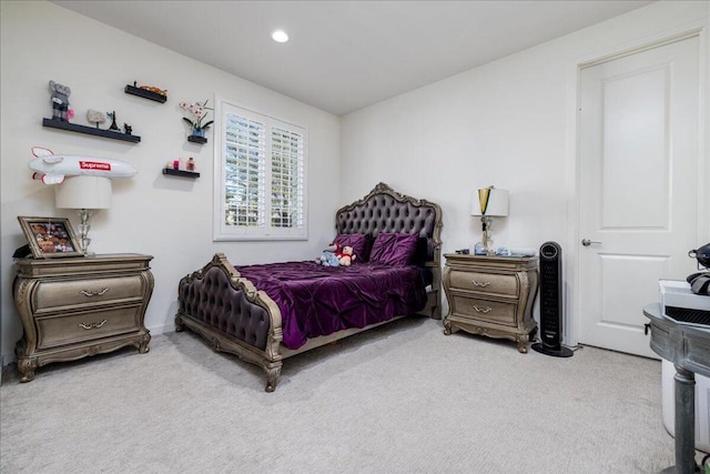 bedroom with light carpet