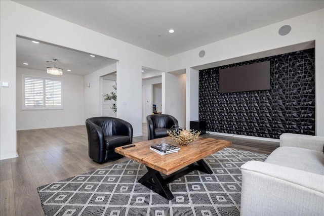 living room featuring dark wood-type flooring