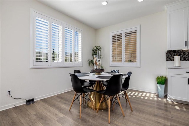 dining space featuring light hardwood / wood-style floors