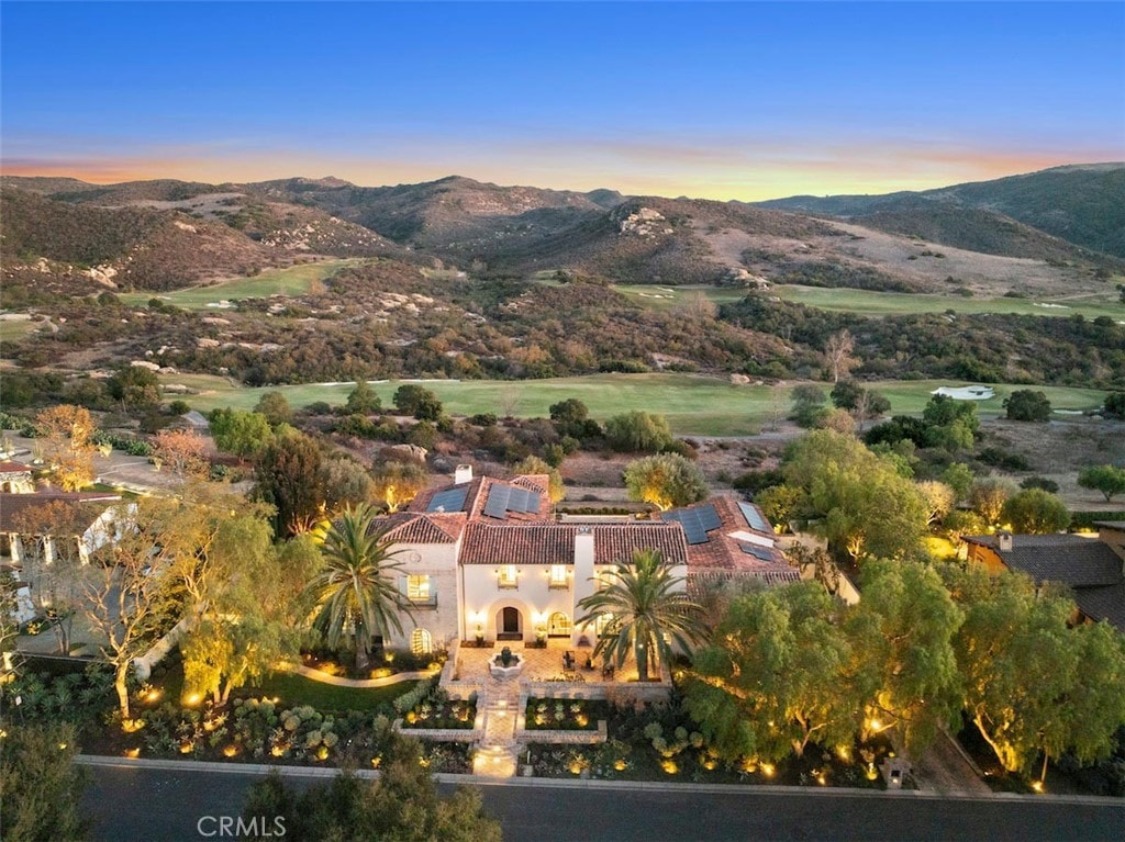 aerial view at dusk with a mountain view