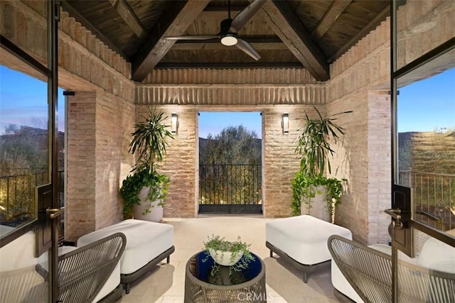 view of patio / terrace with an outdoor living space and ceiling fan