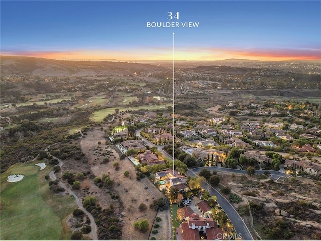 view of aerial view at dusk