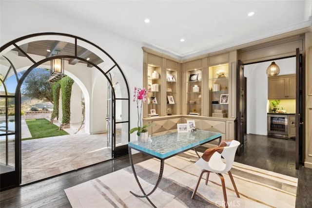 interior space with wine cooler and dark hardwood / wood-style flooring