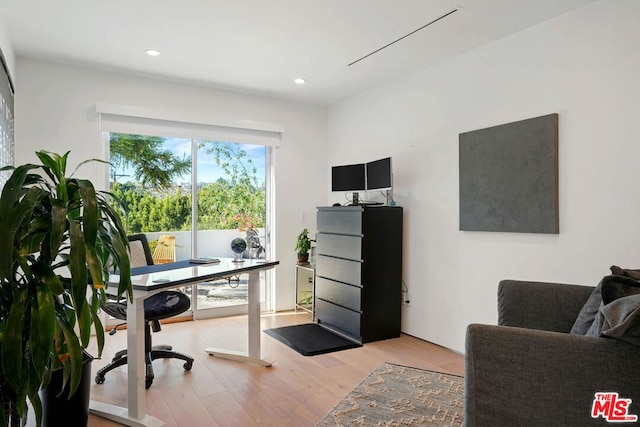 office space featuring light wood-type flooring