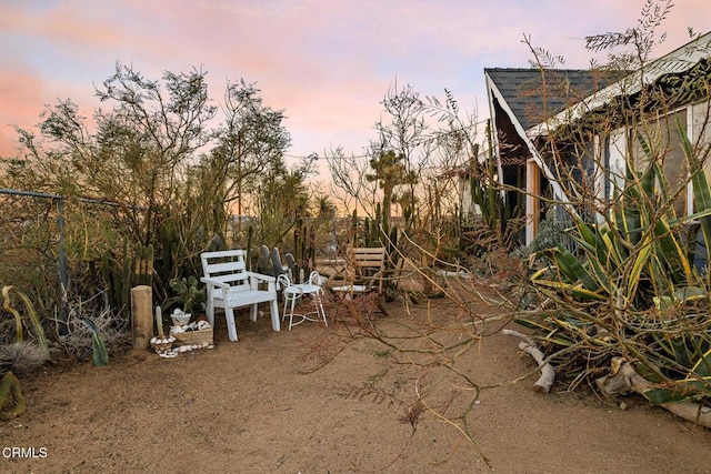 view of patio terrace at dusk