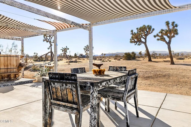 view of patio featuring outdoor dining space