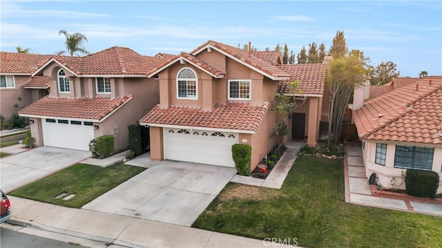 view of front facade with a garage and a front yard