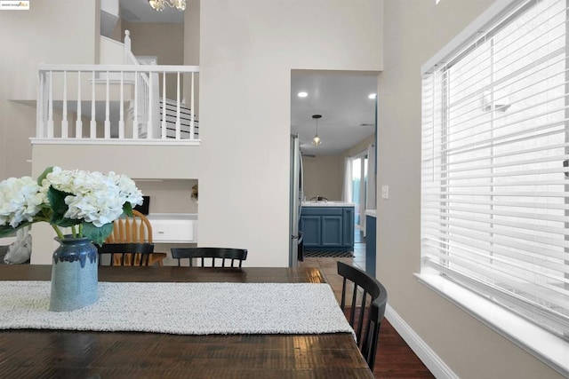 dining space featuring dark hardwood / wood-style floors