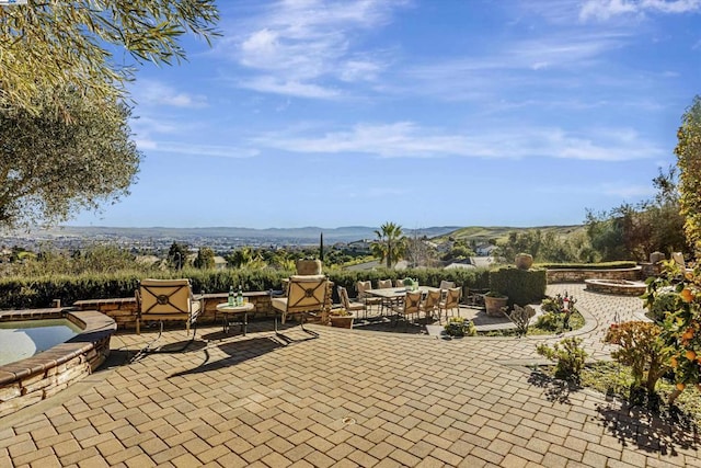 view of patio with a mountain view