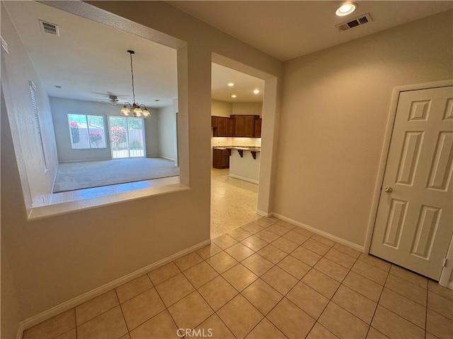 interior space with an inviting chandelier