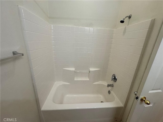 bathroom with shower / bath combination