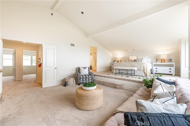 bedroom featuring high vaulted ceiling, beam ceiling, light colored carpet, and a spacious closet